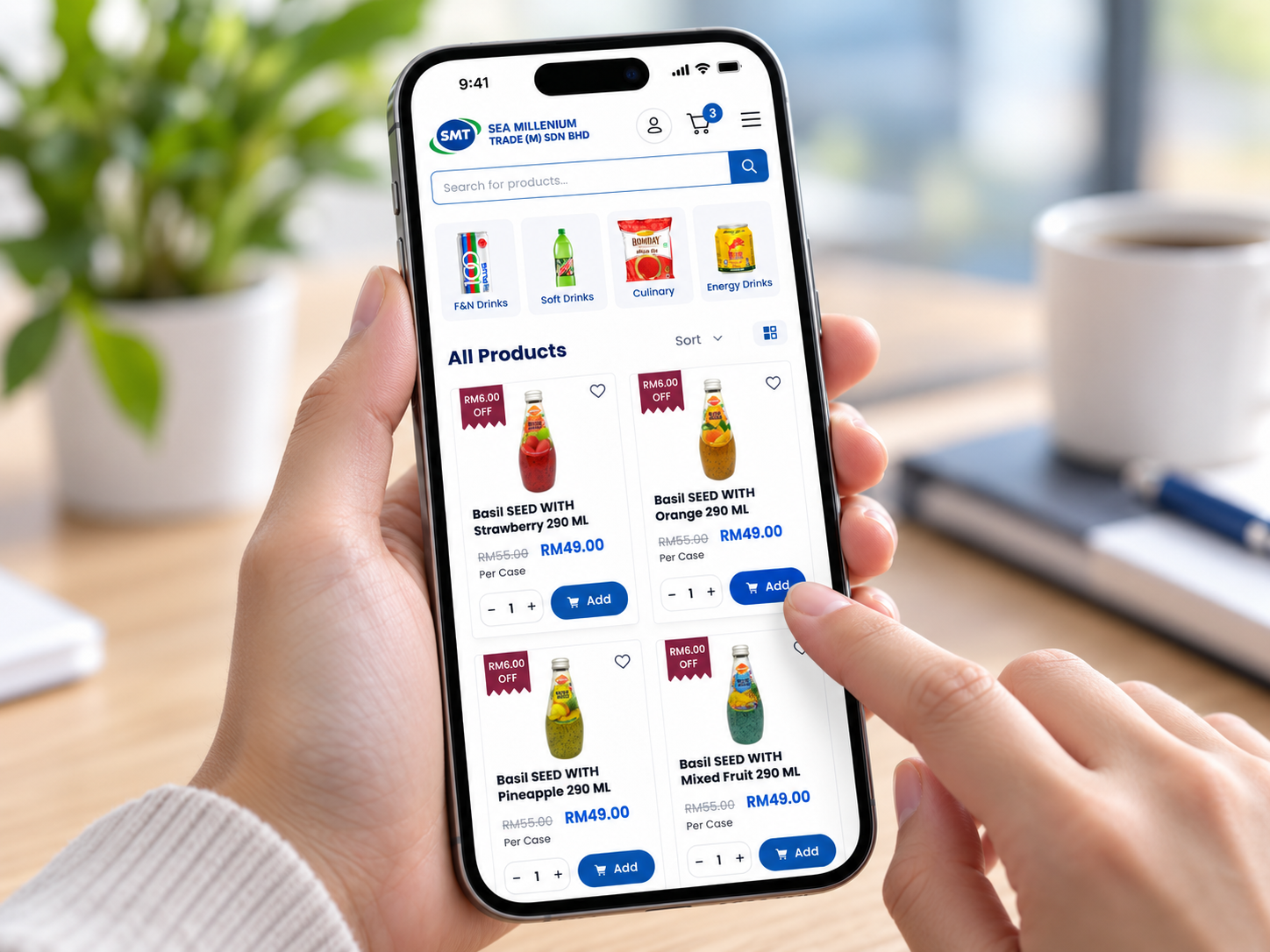 A phone showing products being added to an order on the SMT store